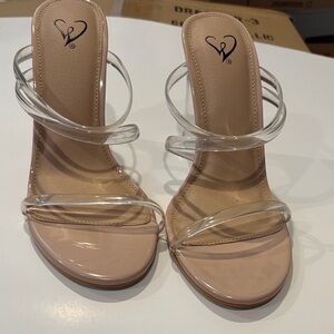 Chic Nude and Clear Strap Heels